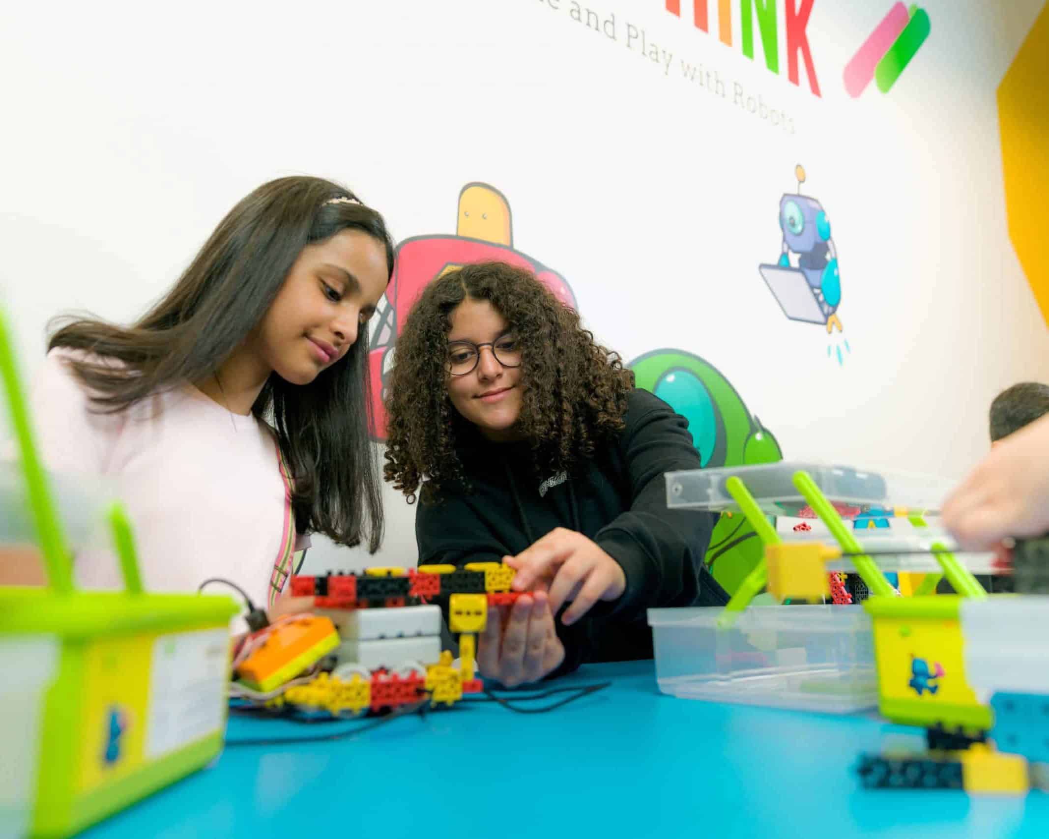 two tween girls in Robothink STEM class