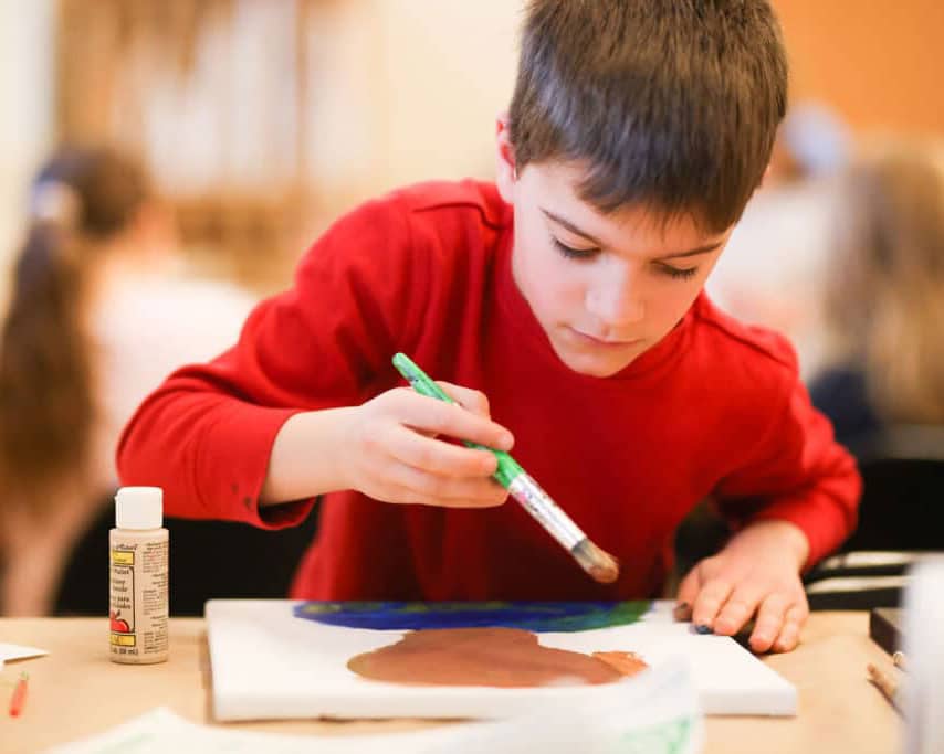 Tween Boy Painting in Art Camp