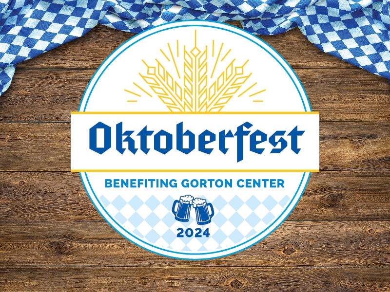 Oktoberfest logo on a wooden background