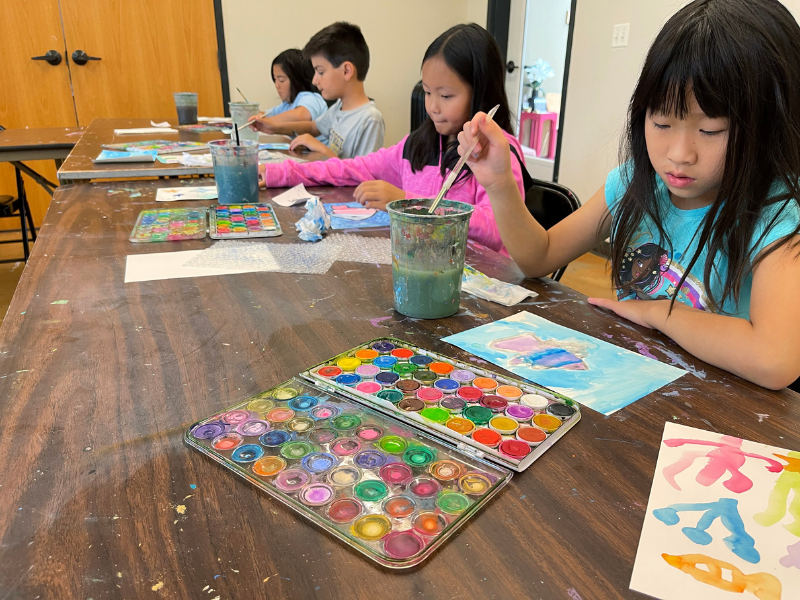 Kids painting with Watercolor at Art Camp