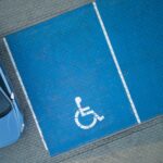 overhead view of accessible parking spaces that are painted blue