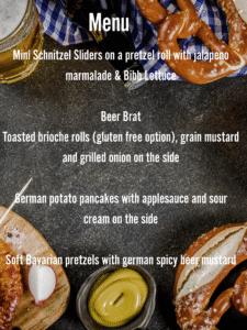 Oktoberfest menu with a stone tabletop in the background with pretezels, mustard and a beer stein around the edges