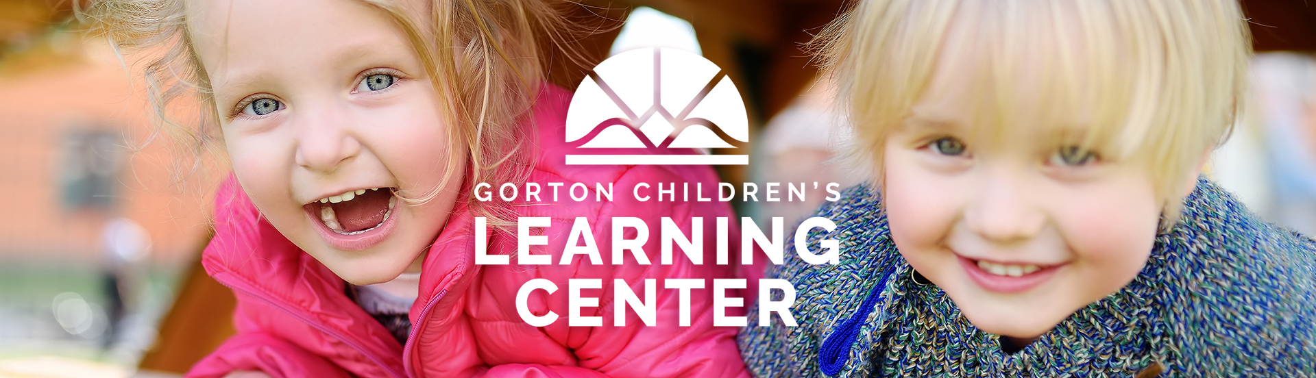Two young children playing outdoors - Gorton Children's Learning Center logo is placed over the image