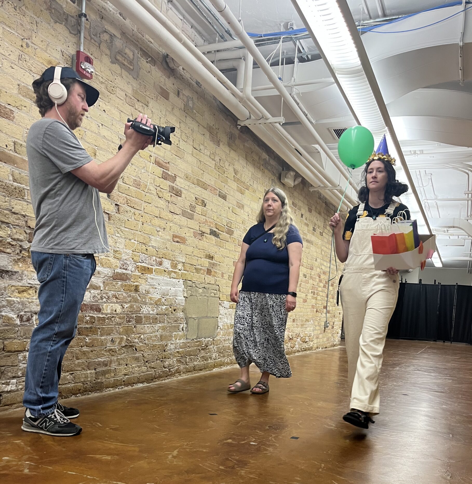 Two actors being filmed