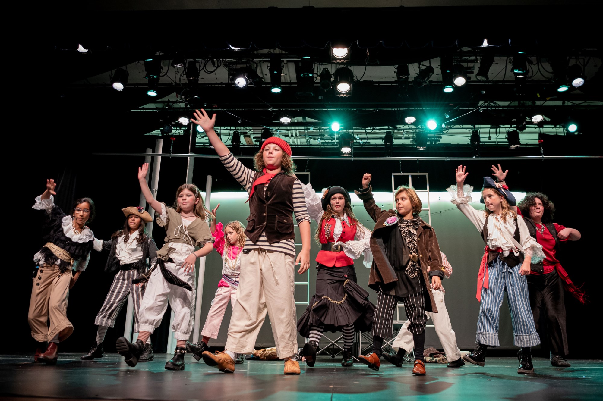 Children pose as pirates