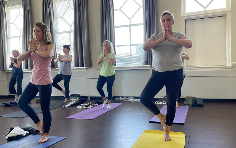 women in a yoga pose