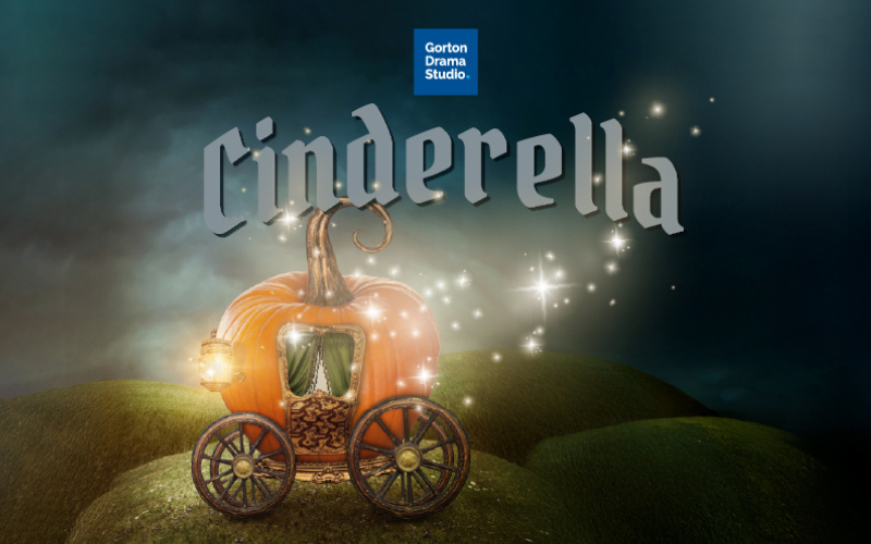 Logo for the 2026 GDS summer musical 'Cinderella'. Cinderella is written at the top in dramatic letters - the image is a pumpkin on wheels with a small lantern on the outside of it. It's sitting on a green hill and the sky behind it is dark and ominous.
