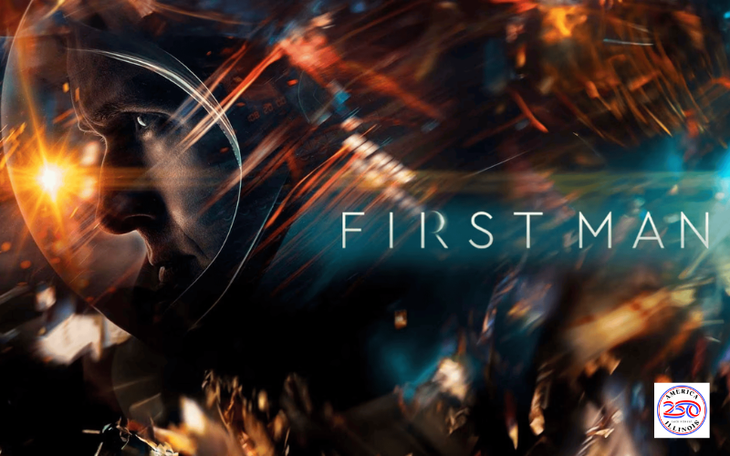 An profile image of an astronaut in his suit- he is surrounded by reflecting lights. In the lower right corner is the 'America 250' logo in red, white and blue