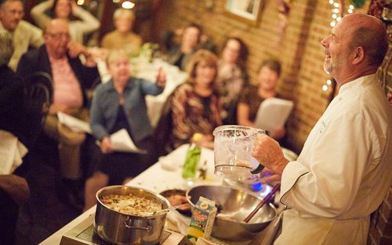 chef thierry teaching a cooking class at froggy's