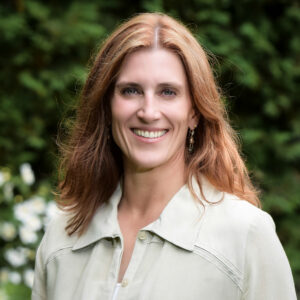A headshot of Dr. Heather Heiberger who is speaking on the panel for the M-Factor